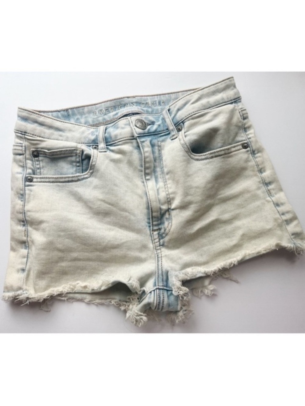 American Eagle Outfitters • Faded Blue Bleached Super High Rise Shorties